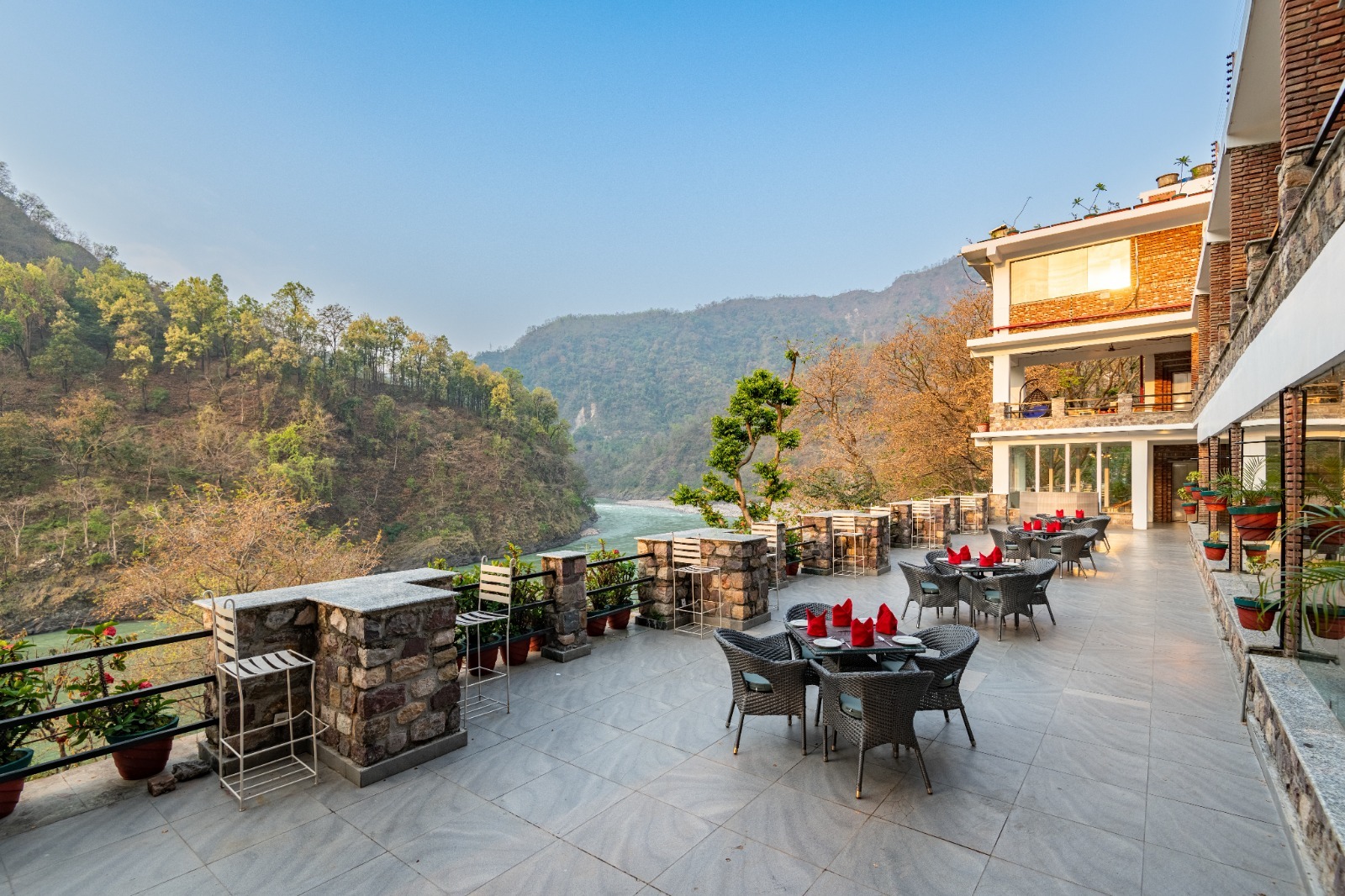 River-view dining terrace at the resort
