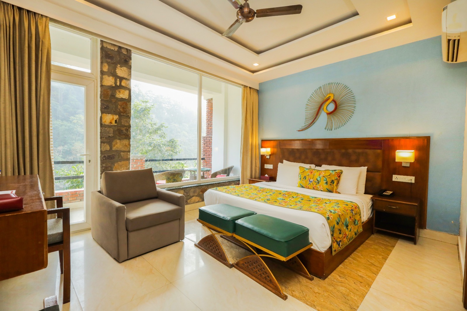 Spacious luxury room with a valley-view balcony
